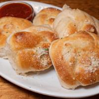 Garlic Knots (6) · Knot to be missed. See what we did there? with marinara.