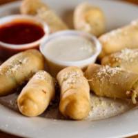 Pizza Poppers (8) · These babies with marinara and ranch are where it’s at.