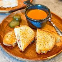 Omg Grilled Cheese · layered gruyere, whipped brie, goat cheese, white cheddar, smoked bacon, creamy tomato soup ...