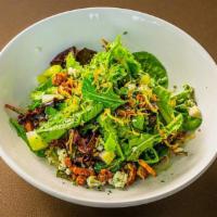 Mixed Greens Salad · Greens with shaved pears, candied pecans, red grapes, gorgonzola, and crispy leeks with popp...