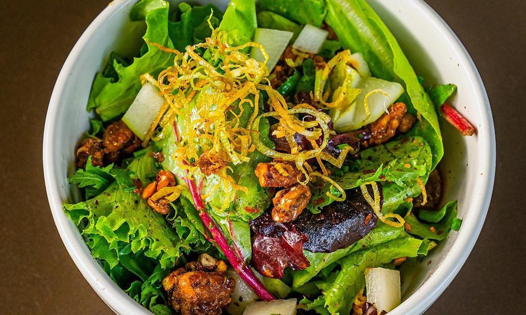 1/2 Mixed Greens Salad · Greens with shaved pears, candied pecans, red grapes, gorgonzola, and crispy leeks with poppyseed vinaigrette. All dressings will be served on the side.