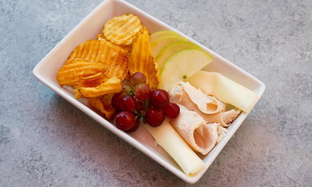 Kids Picnic · An assortment of turkey, provolone, fruit and chips.