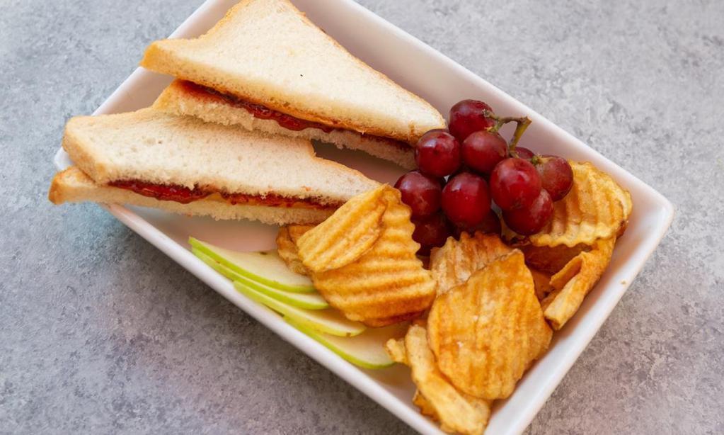 Kids Pbj · Yummy PB&J.  Served with fruit and chips.