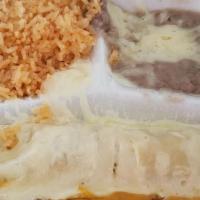 Blanca · One chicken enchilada with sour cream on top & one cheese enchilada with chili con carne on ...