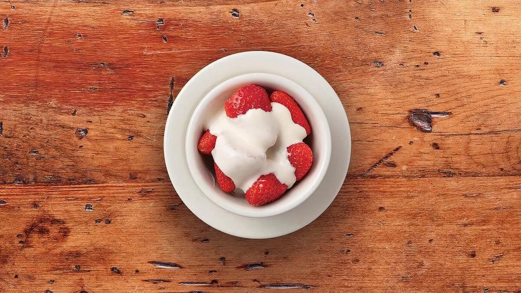 Strawberries Romanoff · Fresh strawberries topped with sweet Romanoff cream.