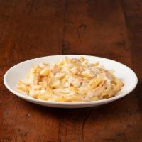 Italian Pasta - Chicken Alfredo · Penne baked in creamy alfredo sauce, topped with grilled chicken, mozzarella and shaved parm...