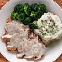 Chicken La Madeleine · Our signature balsamic-marinated chicken topped with creamy wild mushroom sauce, served with...
