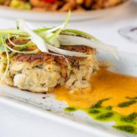Texas Blue Crab Cake* · tomato butter. 

*Consuming raw or undercooked meats, poultry, seafood, shellfish or eggs ma...