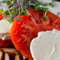 Heirloom Tomato · Buffalo mozzarella, sweet basil pesto,
 balsamic glaze