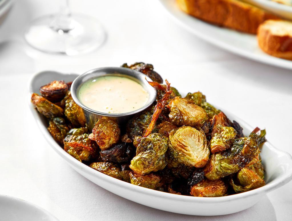 Crispy Brussels Sprouts · caramelized onions, bacon.