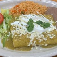 Enchiladas Verdes · Corn tortillas filled with chicken breast topped with our own salsa verde de tomatillo queso...