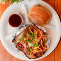 Chopped Baker · A large Idaho baked potato topped with your choice of meat and stuffed with your choice of t...