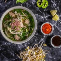 Pho Bo / Vietnamese Beef Noodle Soup · Build your own bowl with two choices of meat.