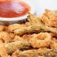 Flash Fried Calamari · Thinly sliced wild calamari and okra halves, hand-battered and flash-fried. Served with choi...
