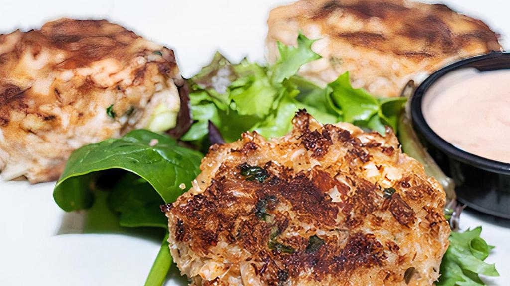 Maryland Crab Cakes · Three seared crab cakes prepared fresh with lump crab and served with our homemade remoulade.