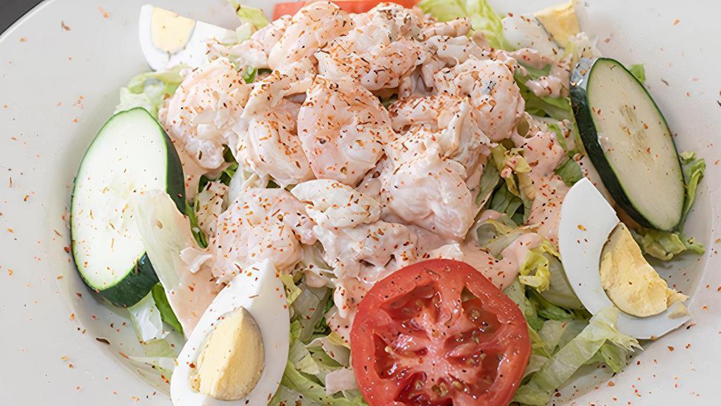 Shrimp & Crab Louis Salad · Lump crab meat and shrimp tossed with our homemade remoulade on a bed of shredded iceberg lettuce, cucumber,. tomatoes, and hard boiled egg.