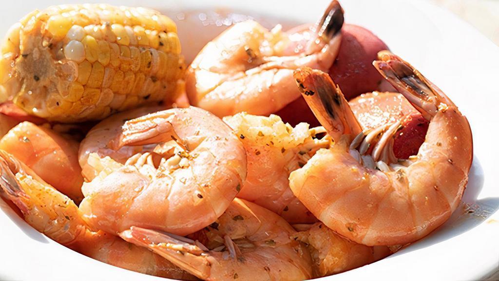 Dozen Peel & Eat Shrimp · One dozen large shrimp tossed in your seasoning of choice and served with corn on the cob and red potato.