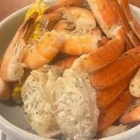 Snow Crab & Shrimp Bowl · Two clusters of snow crab and one dozen large shrimp. Served with corn on the cob and red po...