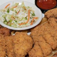 Southern Fried Catfish · U.S. farmed catfish fillets battered in seasoned cornmeal. Served with housemade tartar sauc...