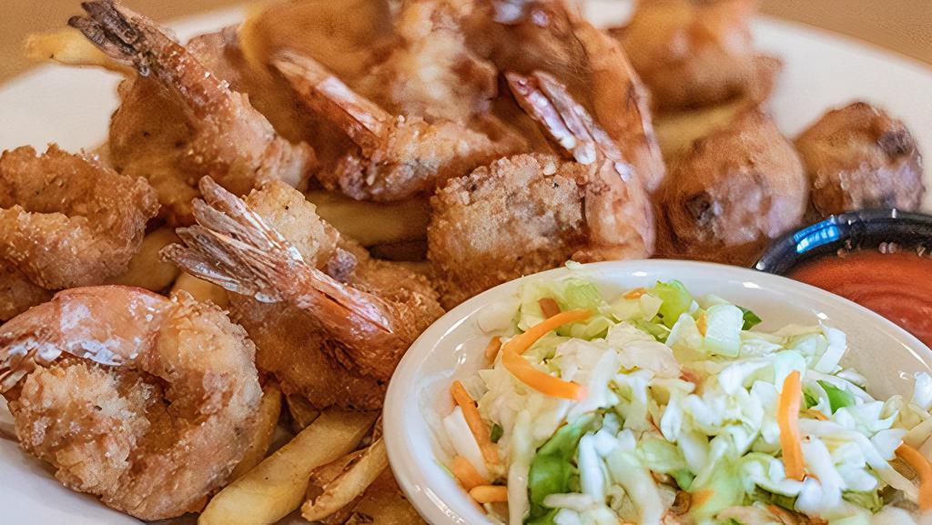 Shrimp Platter · Ten large shrimp battered in seasoned panko. Served with fresh made cocktail sauce. Served with crispy fries, homemade apple cider slaw, and jalapeño hush puppies.