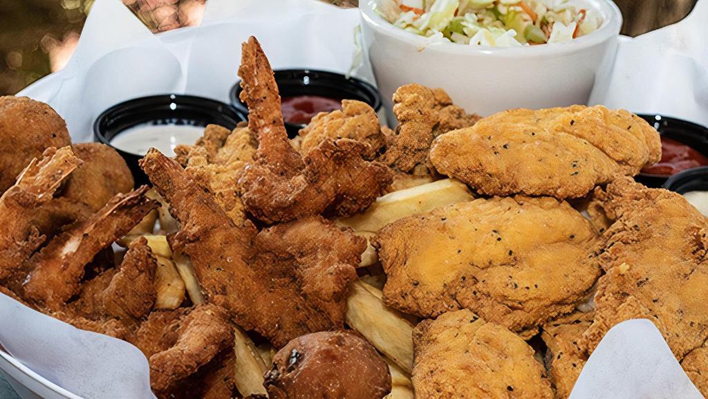 Fry Me To The Moon · A fishermen’s feast! Five large fried shrimp, full serving of our southern fried catfish, three fried oysters, and three Bombs. Served with jalapeno hush puppies, apple cider slaw, and crispy fries.