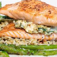Crab Stuffed Salmon · Grilled Atlantic salmon filled with our homemade stuffing of crab, artichoke hearts, fresh s...