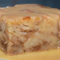 Homemade Bread Pudding · Homemade bread pudding topped with our sweet bourbon butter sauce.