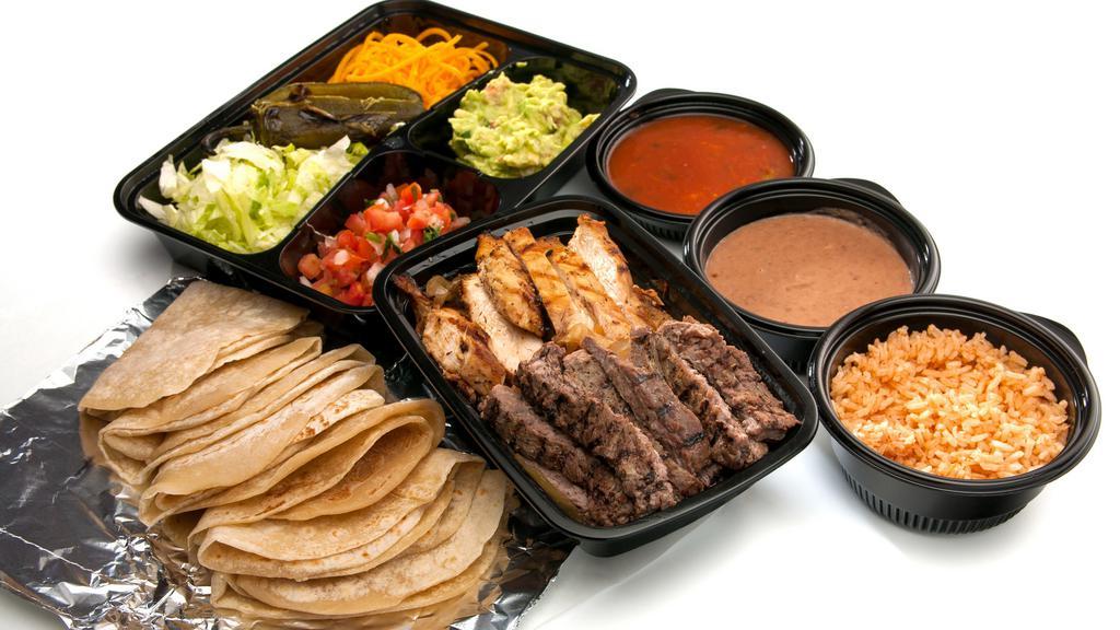 Fajitas For 2 · Served with fresh hand-rolled tortillas and sides of grilled onions, jalapeños, shredded cheese, pico de gallo, lettuce, and guacamole. Includes Mexican rice, refried beans, chips and salsa.