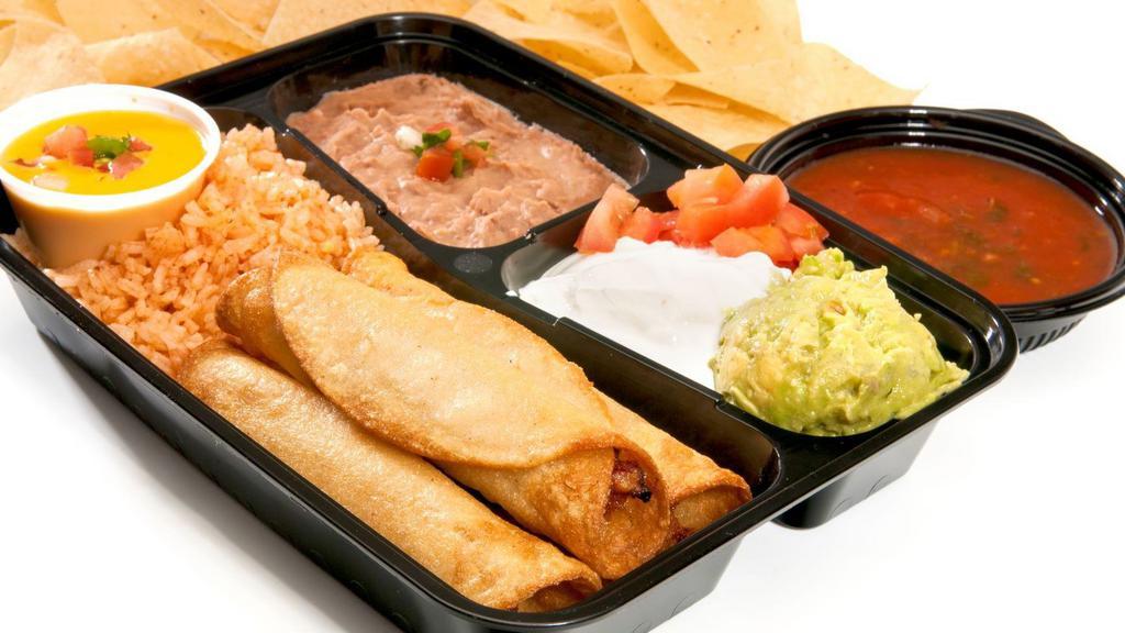 Chicken Flautas · Chicken and melted Monterey cheese in golden, crispy corn tortillas. Served with creamy white queso, rice, beans, guac, and sour cream.