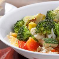 Grilled Vegetable Bowl · Seasonal grilled vegetables with rice. (Vegetarian).