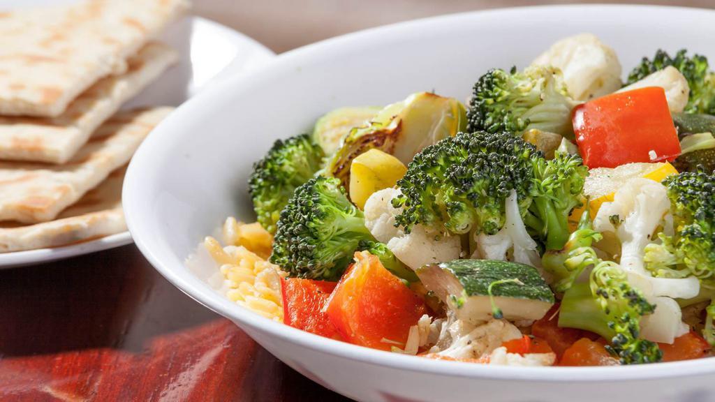 Grilled Vegetable Bowl · Seasonal vegetables over rice. Add side greek salad for extra charges.