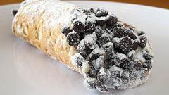 Cannoli · A crispy pastry shell filled with creamy ricotta cheese and a chocolate chip blend. A Little Greek favorite!