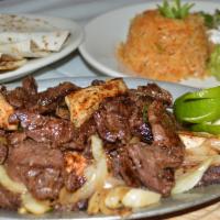 Fajita · Beef or mixed with chicken. Grilled fajita served with rice, beans, pico de Gallo, Guacamole...