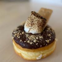 S'Mores · Chocolate dipped Donut with Torched Large Marshmallow with Graham Cracker dusts.