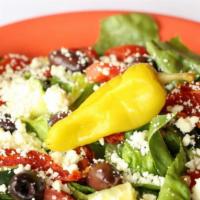 Greek Salad · Feta cheese, roma tomatoes, sun‐dried tomatoes, cucumbers, 
kalamata olives and pepperoncini.