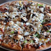 The King · Pepperoni, sausage, Canadian bacon, mushrooms, black olives, red onions, & bell peppers.