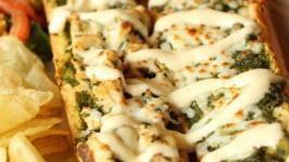Pesto Chicken  · Home-made Palio’s pesto, roasted chicken, melted cheese with lettuce, tomato and creamy Ital...