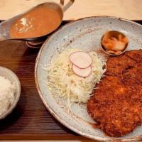 Curry Katsu · Japanese curry over pork cutlet.