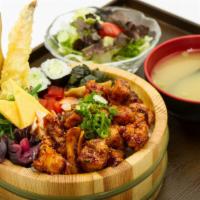 Karaage Ekiben · Spicy soy ginger deep fried chicken with Japanese style side dishes over rice.