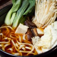 Nabe Udon · Hot pot noodle soup with vegetables and egg.