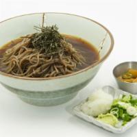 Cold Soba · Chilled buckwheat noodle soup with green onion and dried seaweed.