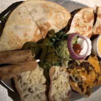 Mena'S Platter · Two bean and cheese nachos, two beef and cheese nachos, one pastor quesadilla, one brisket q...