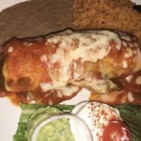 Chimichanga · Flour tortilla stuffed with beef or chicken fajita with onions, bell peppers, and Monterrey ...