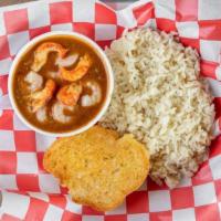 Etouffee (L) · The original smothering sauce, integrated with your pick of shrimp or crawfish. Served with ...