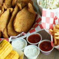 4 Fishes & 10 Shrimps Family Combo · 4 pieces of your choice of fried catfish or tilapia and 10 fried shrimp. Served with 3 large...