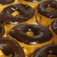 One Dozen Chocolate Iced Donuts +4 Extra Free  · One Dozen Chocolate Iced Donuts +4 EXTRA FREE