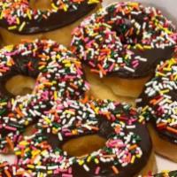 One Dozen Chocolate Sprinkles Donuts +4 Extra Free  · One Dozen Chocolate Sprinkles Donuts +4 EXTRA FREE