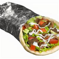 Beef Gyro Sandwich · Served with pita, lettuce, tomatoes and choice of toppings. Served with one white sauce and ...