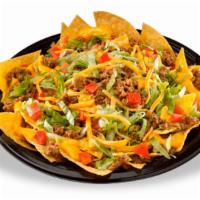 Nacho Deluxe · Large platter of crispy fresh tortilla chips covered with seasoned beef, refried beans, nach...