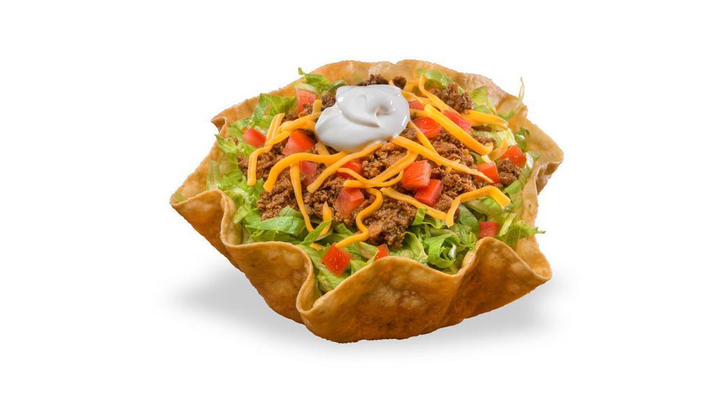 Beef Taco Salad · Crispy taco shell with beans, lettuce, tomatoes, shredded cheddar cheese, and taco meat and choice of dressing (salsa, ranch, honey mustard, or Italian).
